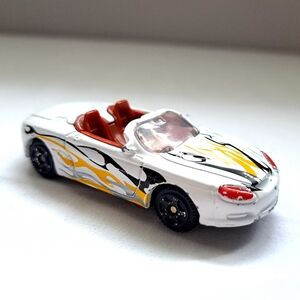 white with yellow and black flames mustang mach III toy car